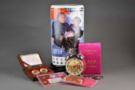 An assembled group of Chairman Mao commemoratives