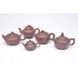 Five Chinese Yixing teapots