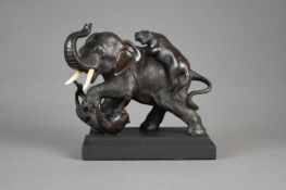 A Japanese bronze figure of an elephant attacked by tigers, Meiji era