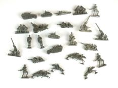 A group of Winterhilfswerk (WHW) models of infantry, artillery and other soldier tokens