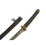 A Japanese Officer's gendaito katana and scabbard signed Ryuminsai Kanetomo