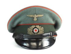 A German Third Reich Artillery pre-war NCO visor cap
