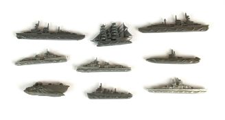 Nine German WW2 Winterhilfswerk toy boats and submarines