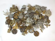 Approximately 100 military badges
