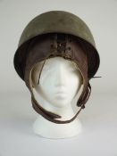 WW2 British Dispatch Rider’s helmet by Briggs Motor Company, with original brown leather liner dated