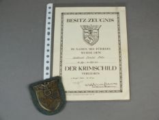 German Crimea armshield with a certificate of the award signed by Erich von Manstein