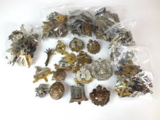 An assorted collection of approximately 100 military badges