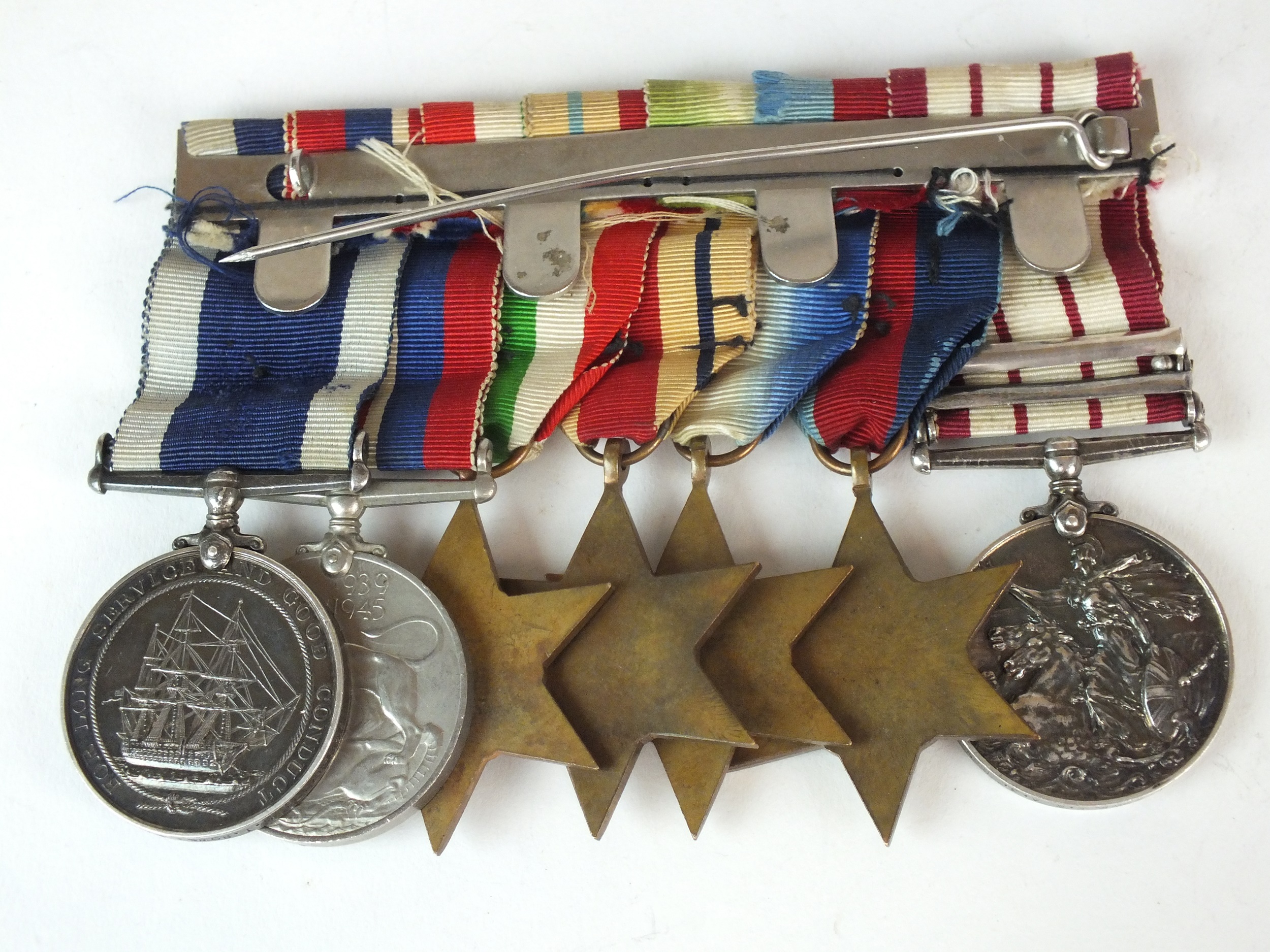 A group of seven WWII medals awarded to G.T Rowe, Royal Navy - Image 2 of 2