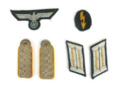 A group of German Army Cavalry insignia