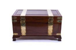 A Chinese brass-bound zhangmu camphour wood chest