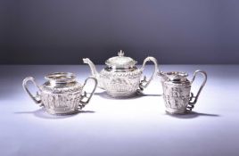 A cased Anglo-Indian silver three-piece tea set by Peter Orr & Sons