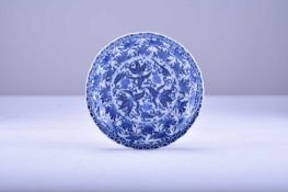 A Chinese blue and white moulded dish, Kangxi