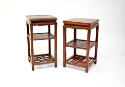 Two similar Chinese hardwood urn stands