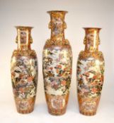 A garniture of three very large Kutani-style floor vases, post-war