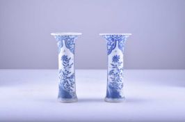 A pair of Chinese blue and white sleeve vases from the Bintan cargo, Kangxi