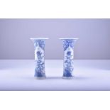 A pair of Chinese blue and white sleeve vases from the Bintan cargo, Kangxi