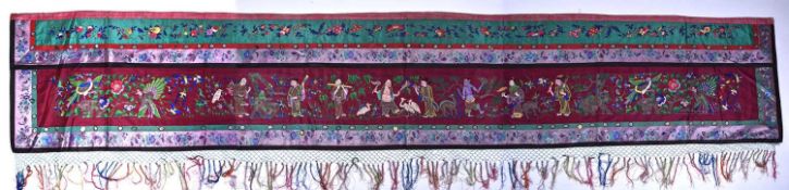 A large Chinese embroidered silk panel of the eight immortals