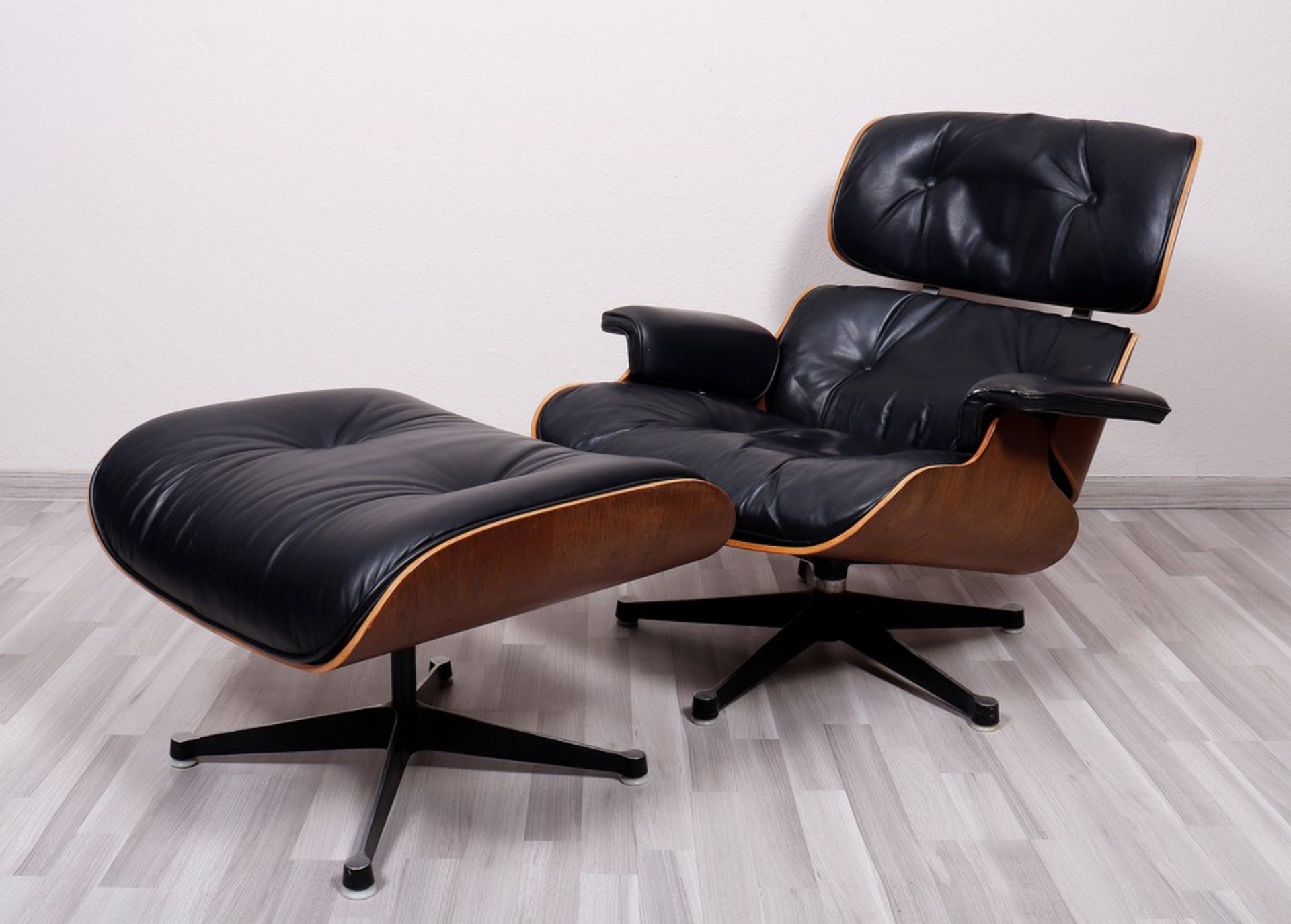 Lounge chair with ottoman, design Charles Eames for Herman Miller, manufactured by Fehlbaum (Herman