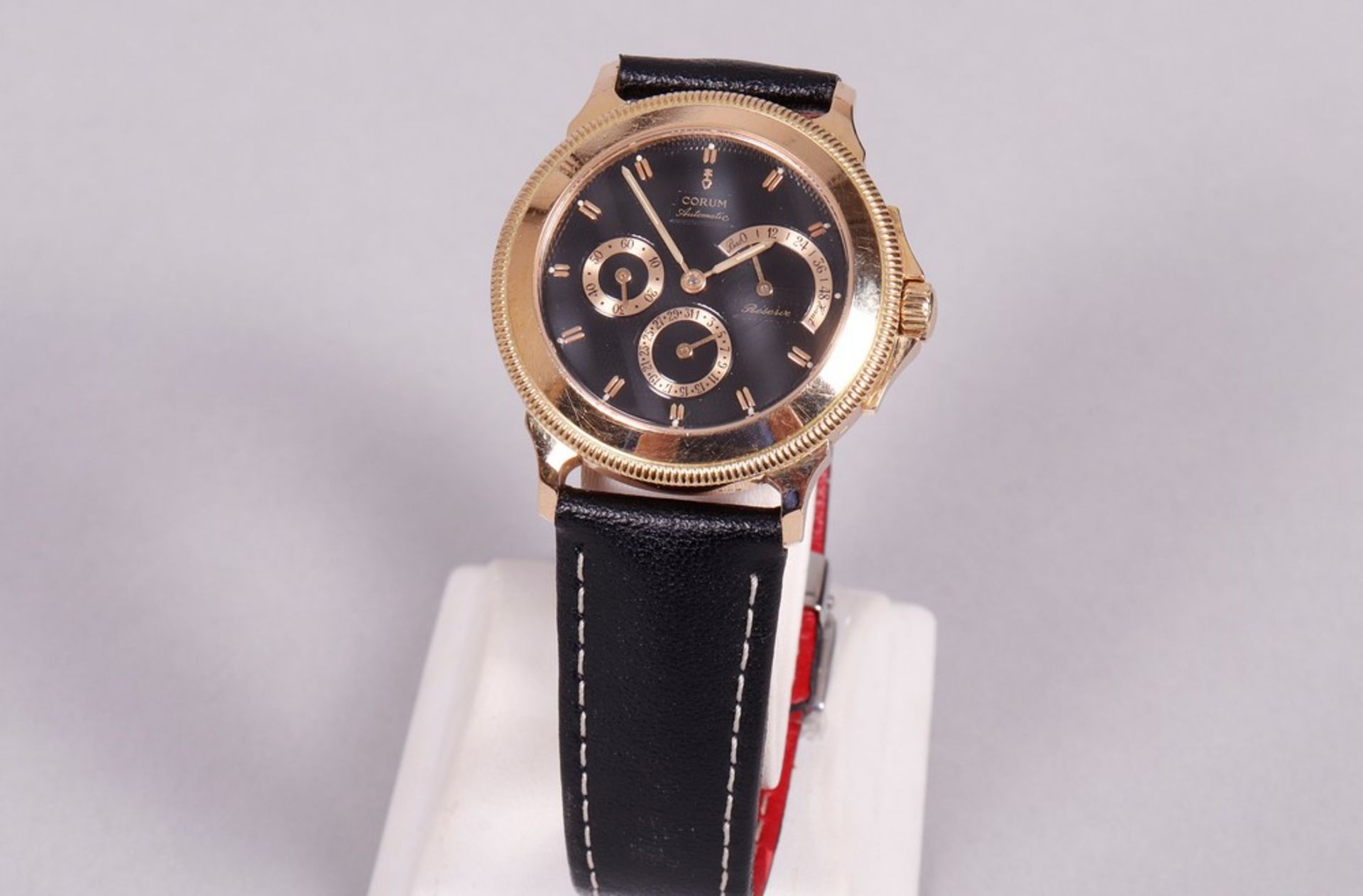 Men's wristwatch, 750 gold, Corum, Reserve de Marche automatic