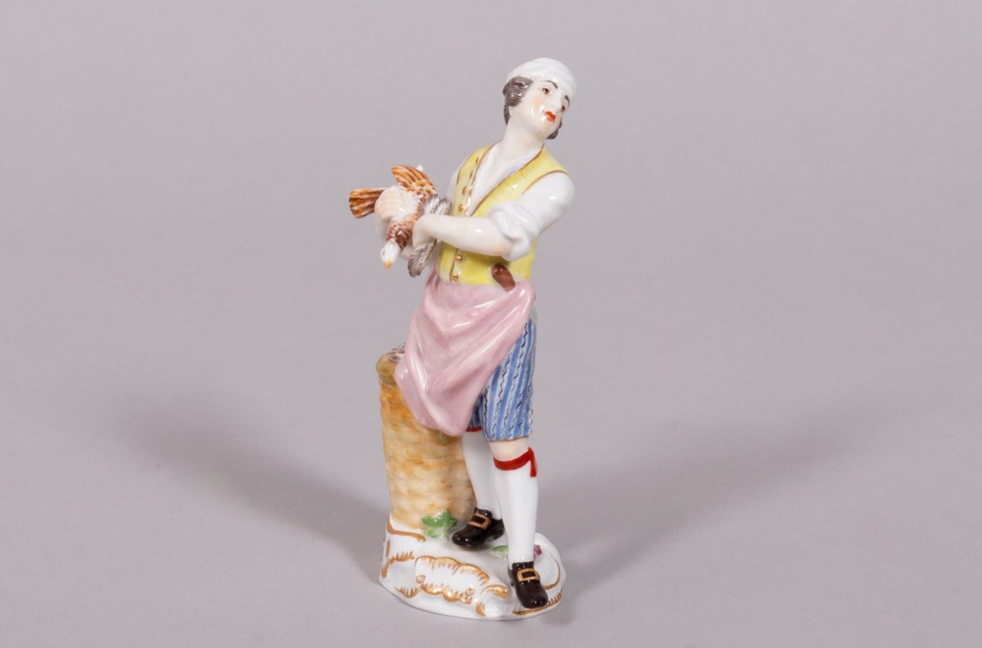 "Cook plucking a rooster", design by Peter Reinicke for Meissen, from the "Cris de Paris" series, p