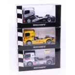 Minichamps: A collection of three boxed Minichamps Race Trucks to comprise: Mercedes-Benz Race Truck