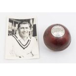 A significant mounted cricket ball, presented to Derek Shackleton early in his career for taking 9