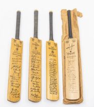 A Gunn and Moore miniature cricket bat with facsimile signatures of Australia 1948, with three