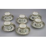 A set of six Mintons coffee cans and saucers, retailed by Goode, each with enamel relief decorated