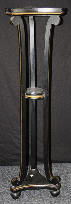 A 19th century ebonized and gilt painted urn stand, the concave triform top on elongated scroll