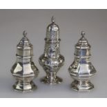 Charles Stuart Harris, a silver pepper of octagonal form, with flame finial on a spreading foot,