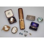 A mixed parcel of bijouterie including 9ct gold mounted and other cameo brooches, three stick