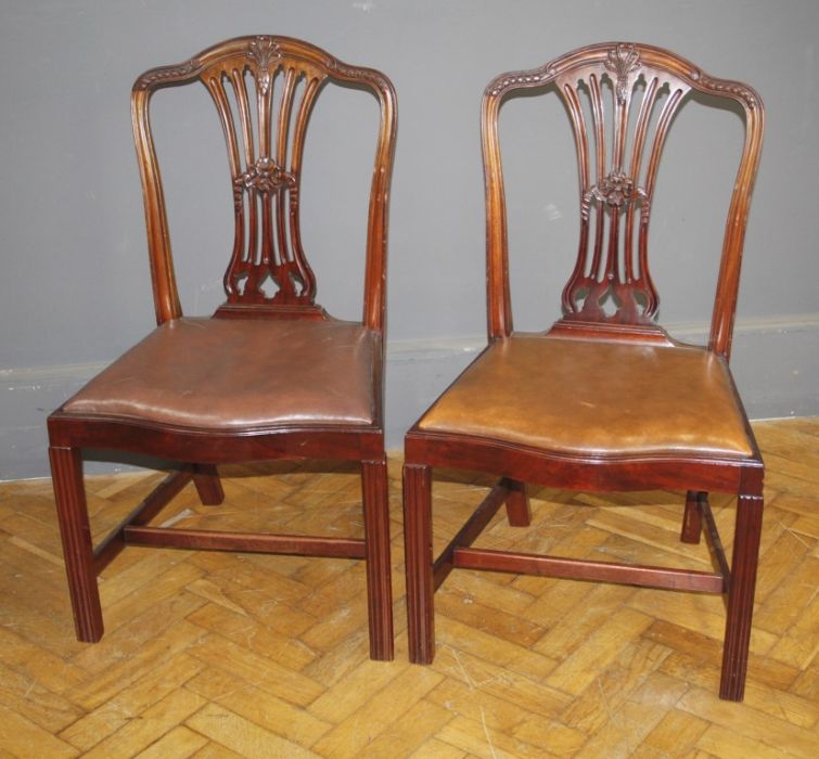 A good set of six reproduction mahogany dining chairs, each having anthemion and bell flower