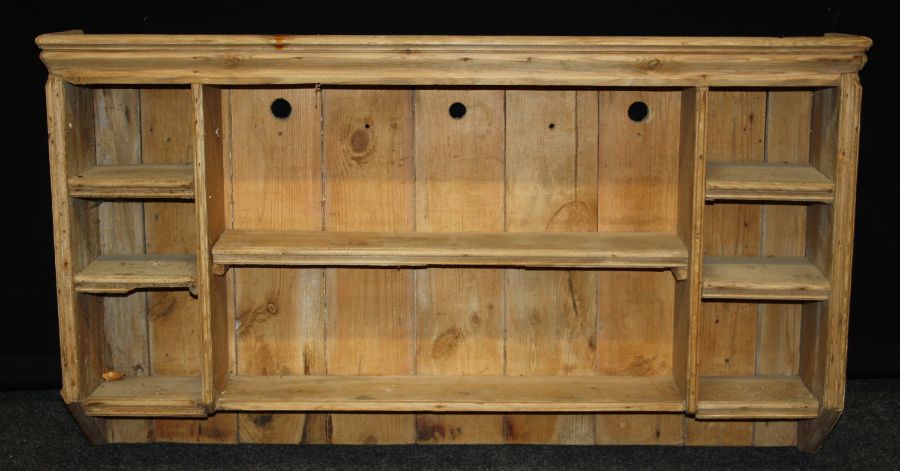 A small 19th century Pine delft rack with planked back, 65 x 115cm