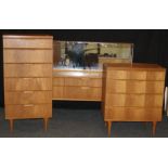 A circa 1960/70's teak bedroom suite comprising a tall chest of six drawers, H 127cm, a mirror