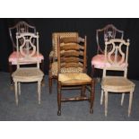 A pair of 19th century French music room chairs, each with lyre splat and cane upholstered seat,