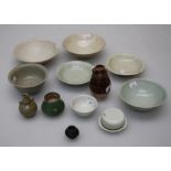 A group of early monochrome wares including a small Qingbai box and cover, a Qingbai foliate dish