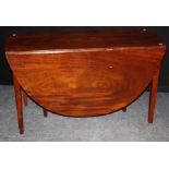 A late George III Cuban mahogany dining table, the rectangular top and demi-lune drop leaves on