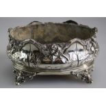 Martin, Hall and Co, Ltd, a Victorian silver table jardinière of oval form, richly cast with
