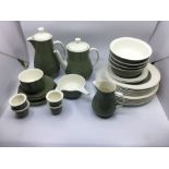 A box of Wedgwood Moss Green pattern tea and dinner wares.