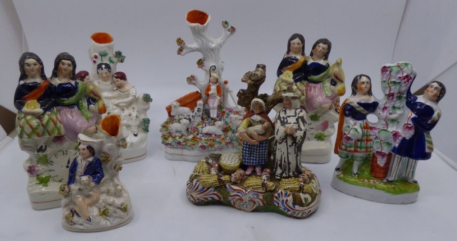 Collection of 19th C Staffordshire figures , including an early tithe  pig group circa 1820 and 6