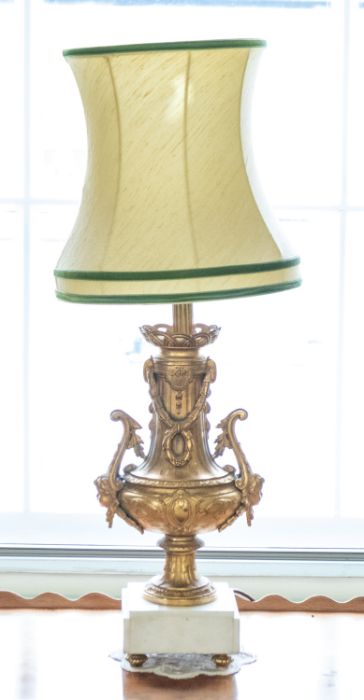 A pair of mid 20th century bedside lights, globular ornate columns with swag decoration, on white