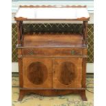 A pair of late 19th century crossbanded mahogany and walnut side cabinets, pie-crusted galleries (