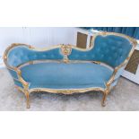 A late Victorian chaise lounge, giltwood with blue upholstery, in rococo style, 79cm H x 130cm W x