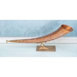 A brass mounted copper and brass horn, 51cm long Please note this item is at an offsite location,