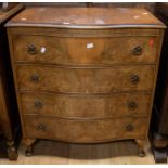 A reproduction mahogany chest of drawers, on padded feet