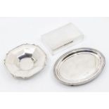 A collection of silver to include: a Georgian style oval gadrooned stand on four paw feet,