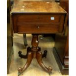 A mid 19th Century mahogany sewing table having two drawers  and splayed legs