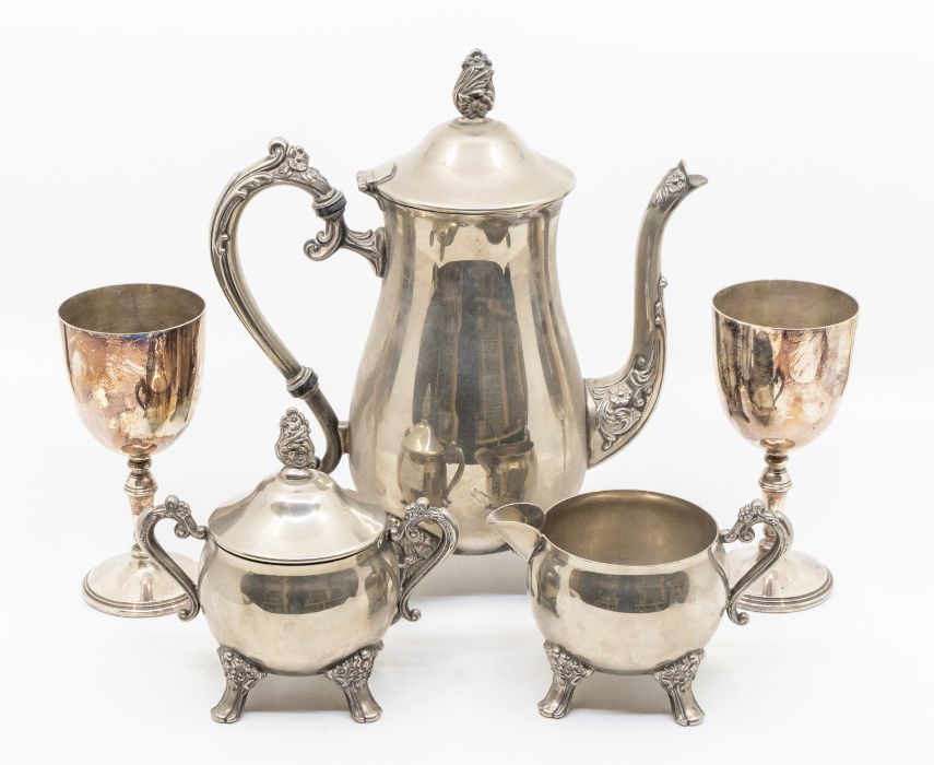 A Victorian style three piece plated tea set together with two plated goblets (5)