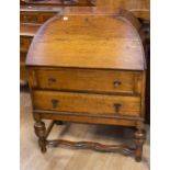 A 20th Century Arts and Crafts style bureau in oak