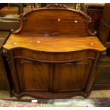 A Victorian mahogany serpentine fronted chiffonier, single drawer above two cupboard doors,